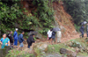 Heavy rains cause land slides and traffic blocks